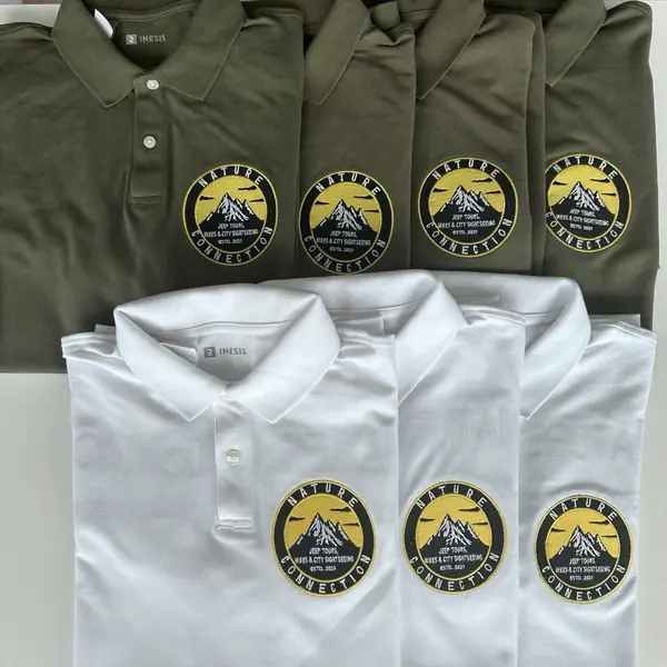 Embroidered polo shirts for a tourism company